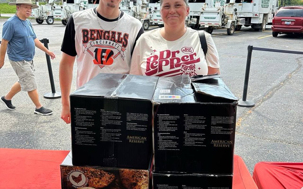 A couple at the sale table with their order